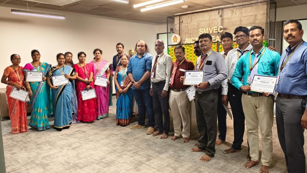 Faculty members receiving certificates upon successful completion of the workshop.